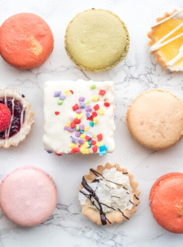 Chocolate covered rice crispies, tarts, and macaroons from bakery